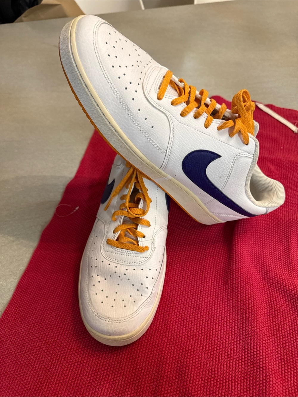 Nike Men’s White Low-Top Sneakers with Purple Swoosh and Orange Laces